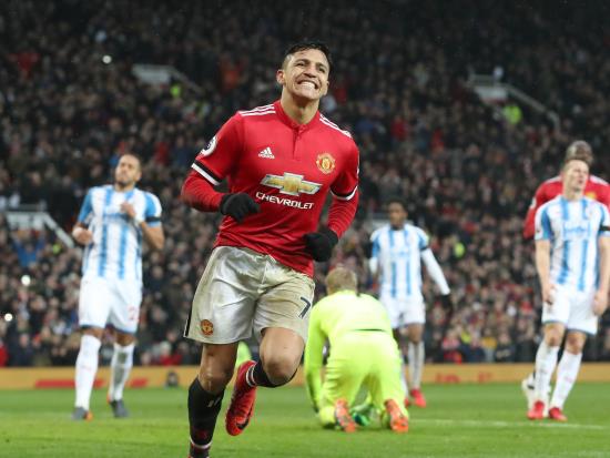 Manchester United 2 - 0 Huddersfield Town: Alexis Sanchez scores on home debut as Old Trafford remembers Munich air disaster