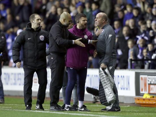 Guardiola loses cool as Wigan dump Manchester City out of FA Cup