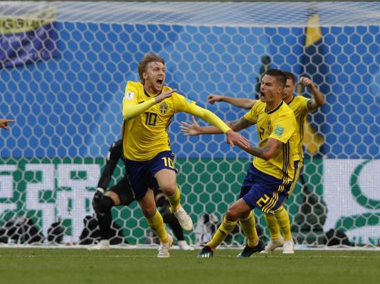 Deflected Emil Forsberg strike sends Sweden into quarter-finals