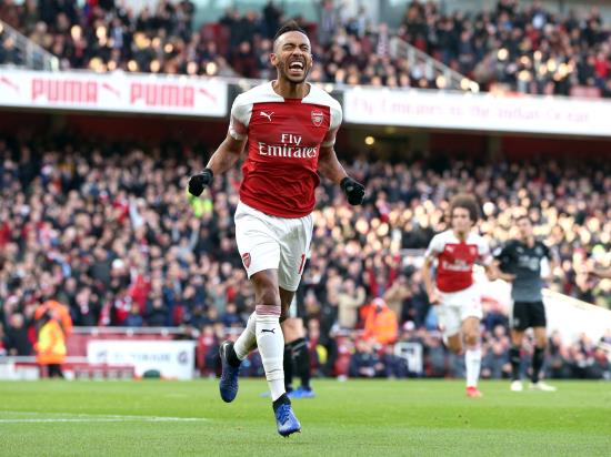 Ozil returns to pull strings as Aubameyang double earns Arsenal victory