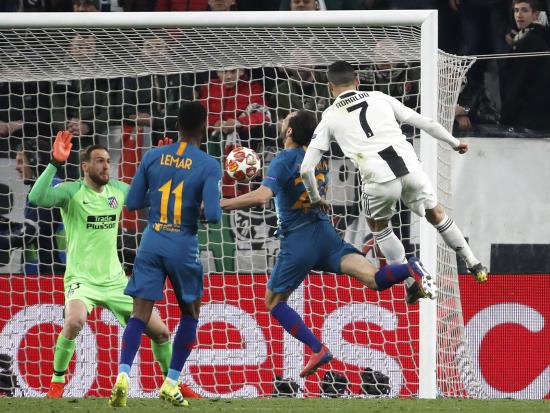 Ronaldo hat-trick sinks Atletico and sends Juve into last eight