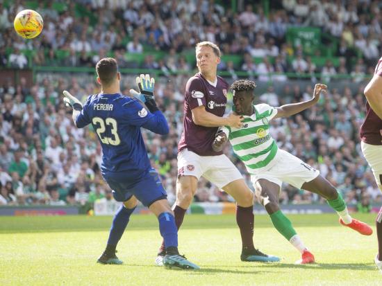 Bayo strikes twice as Celtic beat Hearts to return to top of table