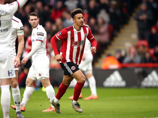 Sheffield United hold on to deny non-league Fylde a replay
