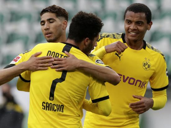 Jadon Sancho shines from bench as Borussia Dortmund keep up title tilt