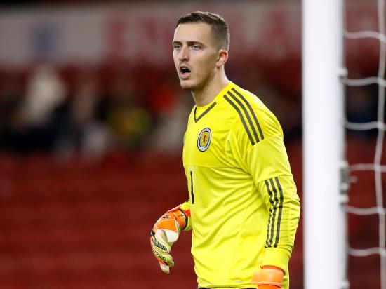 Brian Rice hails Ryan Fulton after the keeper’s save helps earn Hamilton a point