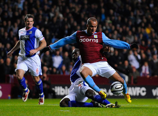 Gabriel Agbonlahor is brought down