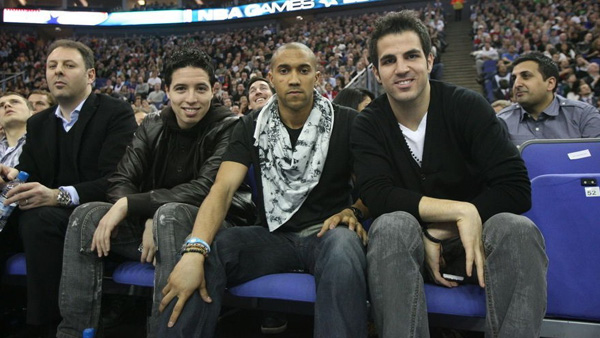 Arsenal soccer players watch NBA basketball match at the O2 Arena in London