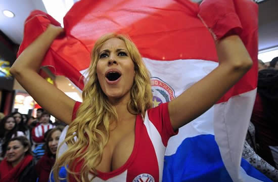 Female football fans light uppa the Copa America