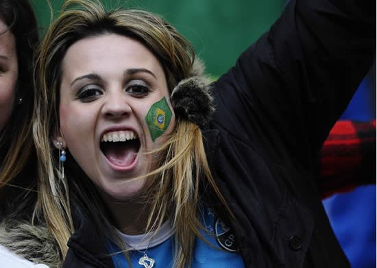 Female football fans light uppa the Copa America