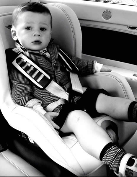 Dapper Kai Rooney travels in style