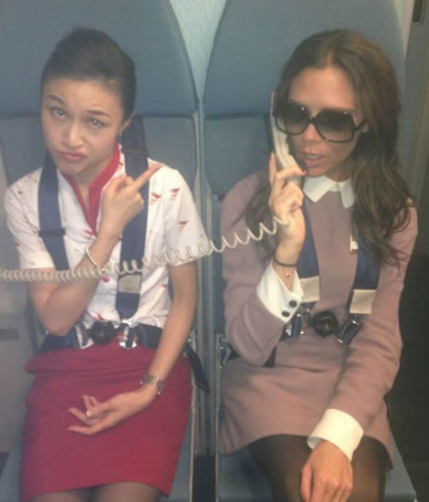 Victoria Beckham joins cabin crew on Beijing flight