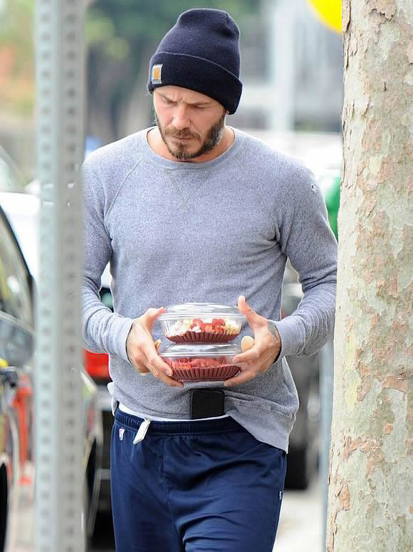 Time for cake! David Beckham and son Brooklyn head home with dessert after working out