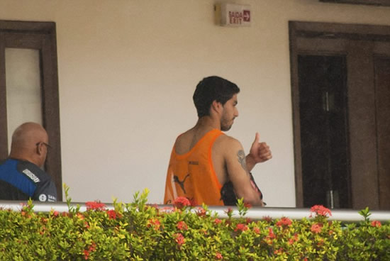 A broken-looking Luis Suarez pictured at Uruguay team hotel after learning of his 4-month ban from football