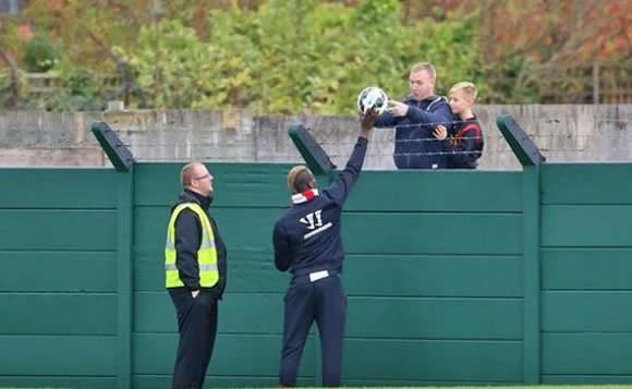 Mario Balotelli Good News Story: Stayed back on his own after Liverpool training, signed ball for fan