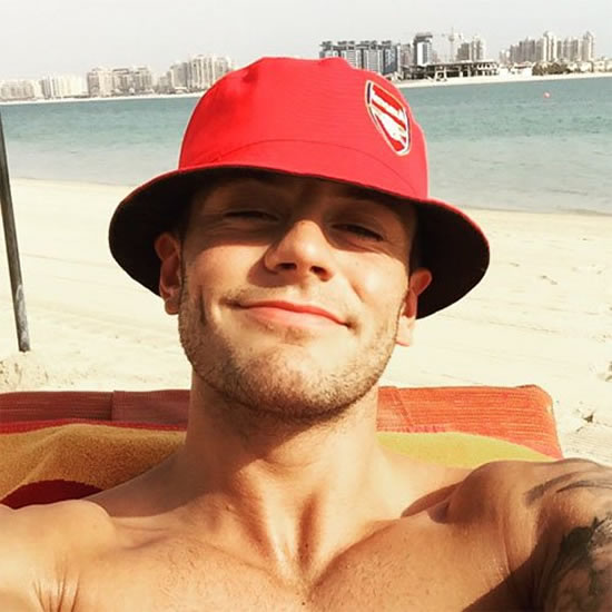Photo: Jack Wilshere shows commitment to Arsenal in holiday snap