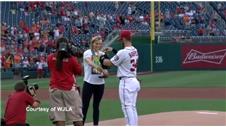 Olympic swimmer Ledecky throws ceremonial first pitch