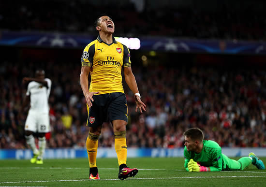 Arsenal 2 - 0 Basel: Theo Walcott double sees Arsenal beat Basle in the Champions League