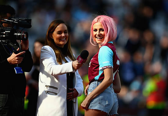 Sexy Pixie Lott flashes bum during West Ham half-time performance
