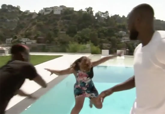 Watch Man Utd star Paul Pogba shock reporter by pushing her into swimming pool