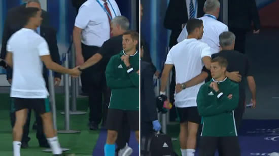 Cristiano Ronaldo and Mourinho greet each other in the tunnel