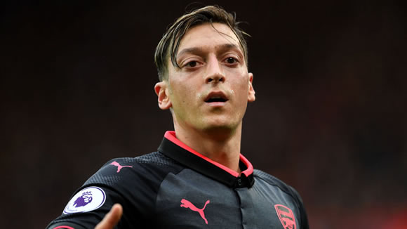 Arsenal boss Arsene Wenger 'genuinely thinks' Mesut Ozil wants to sign new deal with club