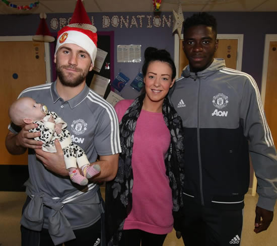 Manchester United stars Paul Pogba and Zlatan Ibrahimovic make heartwarming Christmas trip to hospital to visit poorly kids
