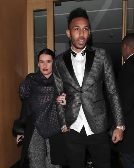 Arsenal star Pierre-Emerick Aubameyang heads home from dinner with girlfriend before jumping in custom £150,000 gold Range Rover