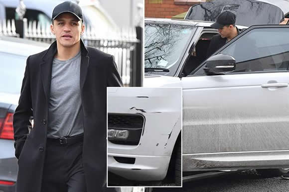 Has Alexis Sanchez lost his drive? Under-fire Manchester United striker returns from restaurant to a smashed-up Range Rover