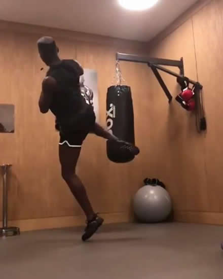 Manchester United star Paul Pogba shows off kung fu kick as he battles Zlatan Ibrahimovic to see who can get leg higher