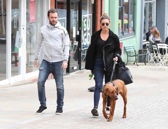 Manchester United ace Juan Mata puts on brave face as he walks his dog with partner Evelina Kampf despite being dropped by Jose Mourinho for Arsenal clash