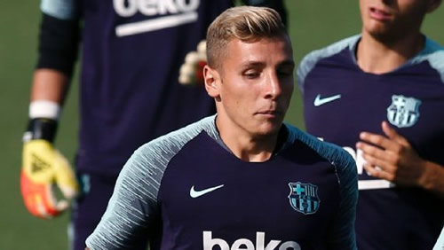 Barcelona's Lucas Digne returns to Spain to finalise Everton move