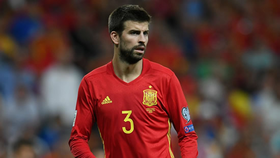 Pique confirms retirement from Spain national team to focus on Barcelona