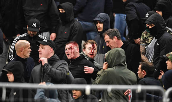 AEK Athens vs Ajax violence: Fans attacked with 'petrol bombs' in explosive scenes