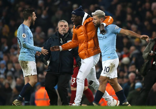Stewards chase Benjamin Mendy thinking he is pitch invader after Man City win
