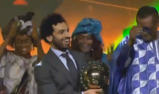 Cringe-worthy moment Mo Salah dances awkwardly on stage after winning award