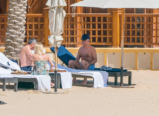 ONE SPECIAL FRIEND Married footie boss Jose Mourinho spotted on a sunshine break with special female friend