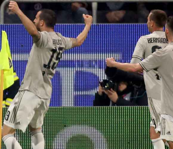 Cagliari 0 Juventus 2: Bonucci leads champions a step closer to title