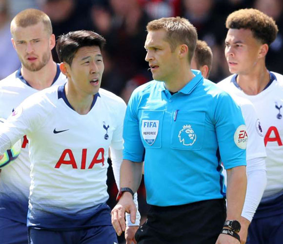 Bournemouth 1 Tottenham 0: Nine-man Spurs lose to late Ake header