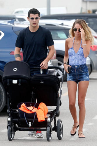 Alvaro Morata and stunning wife put on brave faces on trip out with twins as couple plan to move house after horrifying raid
