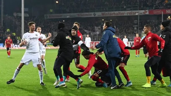 Frankfurt star DECK opposing manager to spark riot in wild scenes during clash with Freiburg
