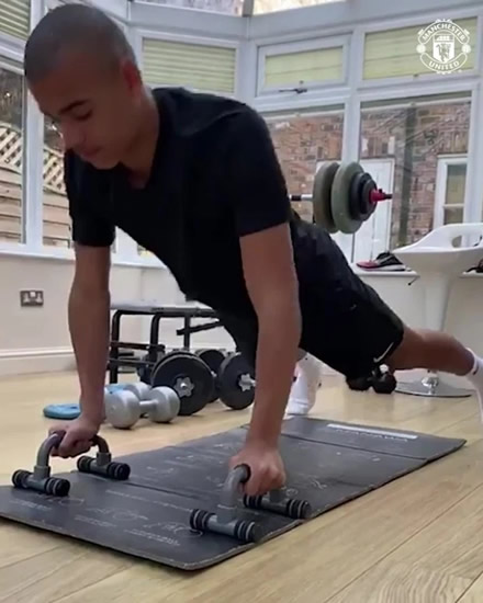 Man Utd wonderkid Mason Greenwood shows off dramatic new haircut after shaving head as he keeps fit in home gym