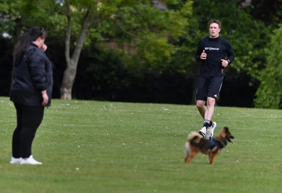 Phil Jones trains alone on field with just a dog for company as Man Utd defender gears up for Premier League restart