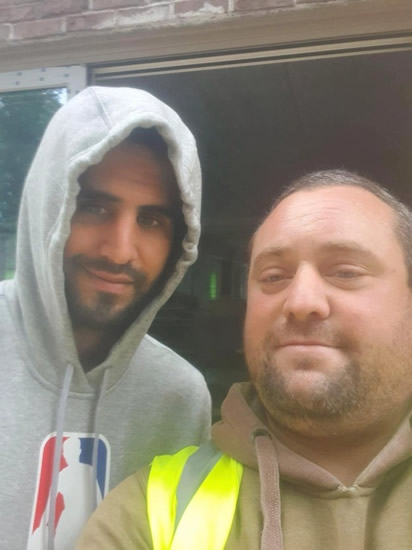 OWN GOAL Manchester United fan sacked after breaching coronavirus guidelines to take selfie with City ace Riyad Mahrez