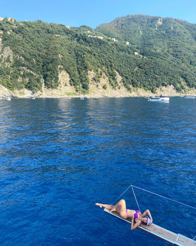 Georgina Rodriguez stuns in purple bikini as Cristiano Ronaldo's girlfriend enjoys holiday
