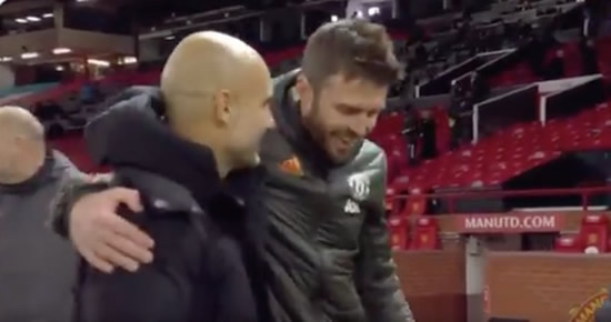 Michael Carrick and Pep Guardiola's intense chat after Manchester derby confuses fans