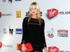 Kisses: Laura Whitmore arrived in a tiny black dress with a Lulu Guinness lip clutch bag