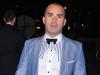 Head turner: Louie Spence wore a bright blue jacket with matching shirt and PVC bow-tie