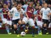 Giving their all: Andros Townsend and Gabriel Agbonlahor battle for the ball