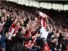 Mame Biram Diouf celebrates Stoke City's third goal with fans in the Boothen End. 