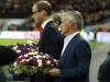 TRIBUTE: Prince William and France coach Didier Deschamps lay floral tributes